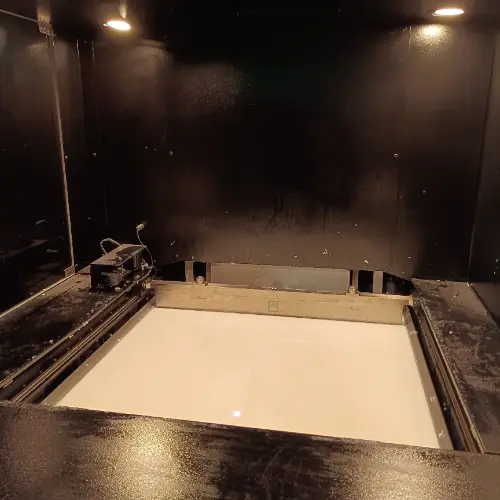 High-precision resin 3D printer, used for creating detailed prototypes in our rapid prototyping service.